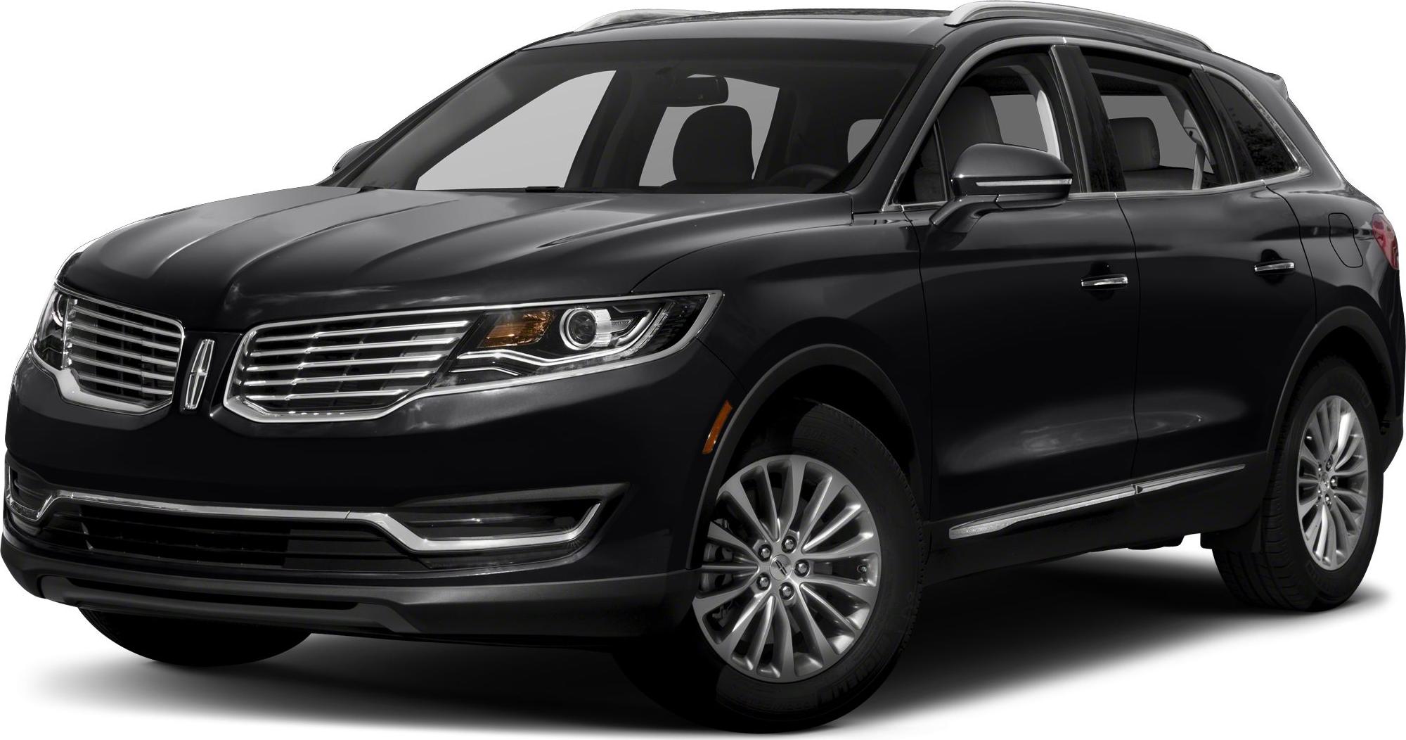 Front-side view featuring LED headlights, chrome grille, and alloy wheels