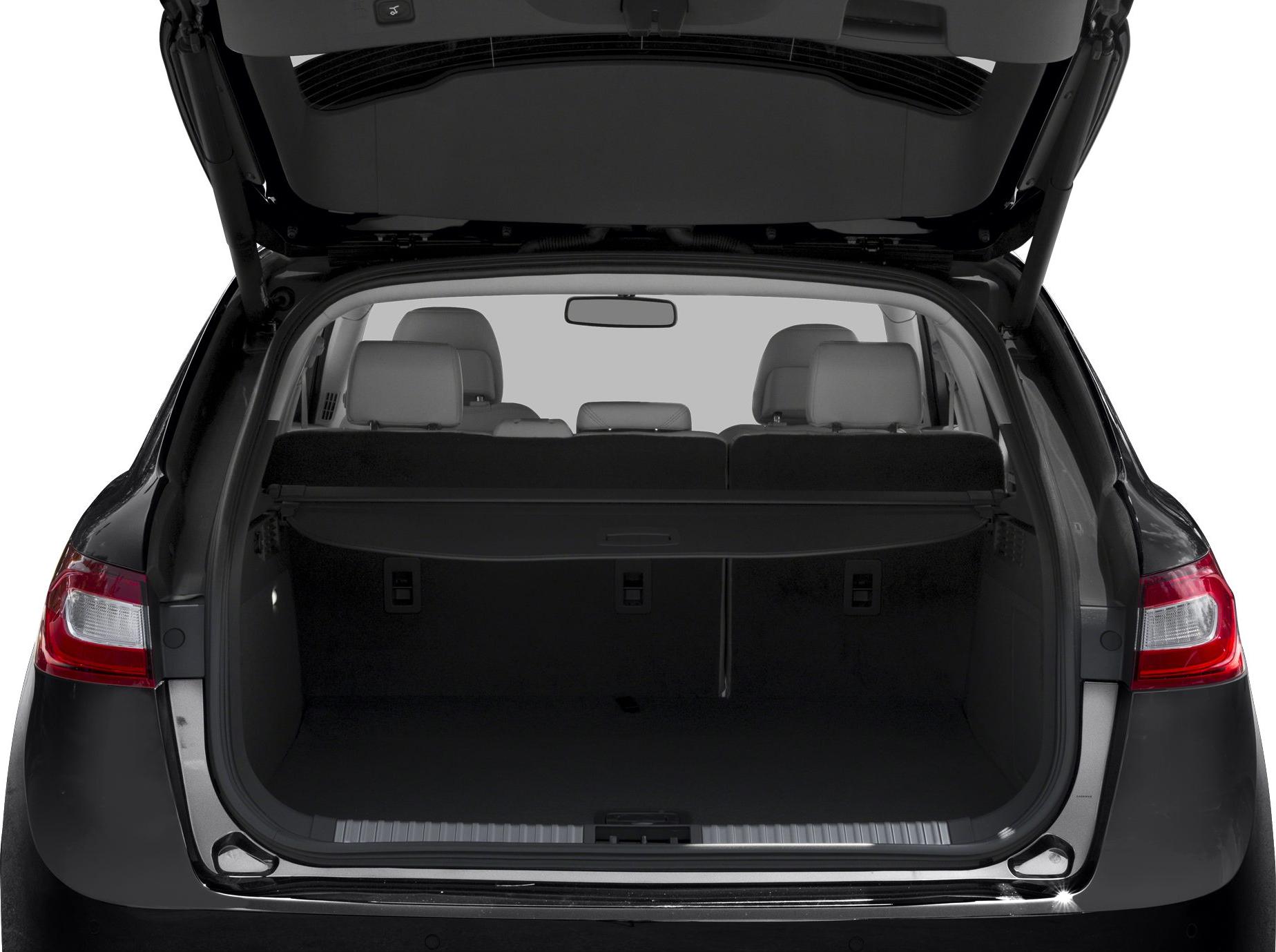 Spacious rear cargo area with open hatch and visible rear seats.