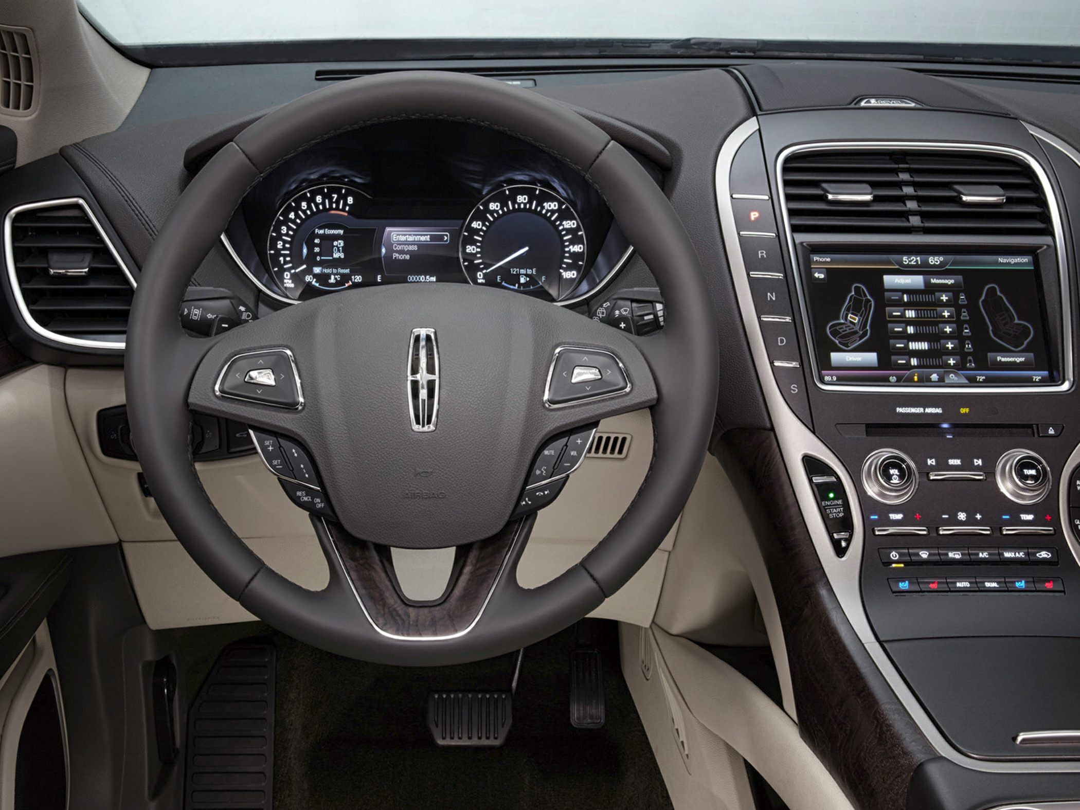Steering wheel with multi-function buttons and central dashboard control panel