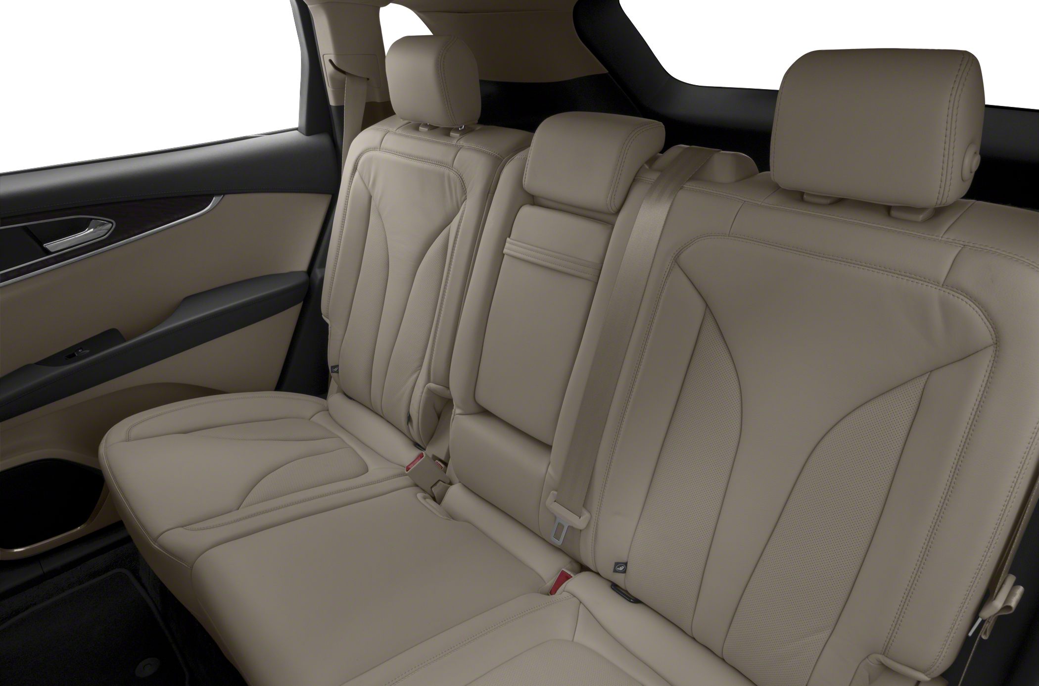 Beige leather rear seats with headrests and intricate stitching