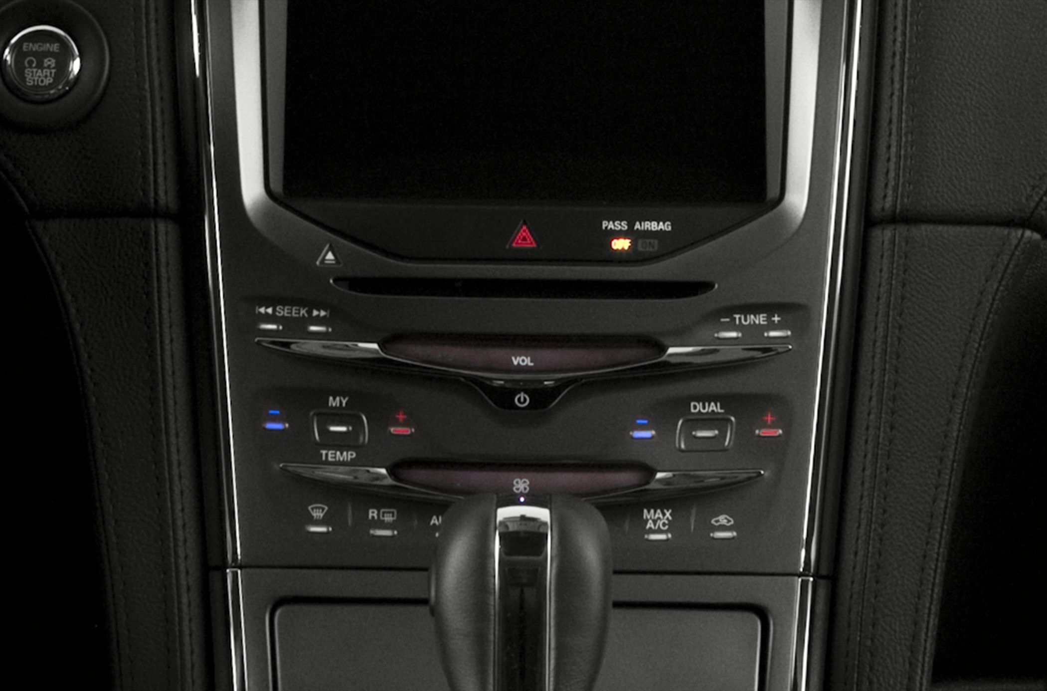 Center console with audio controls, climate settings, and gear shifter