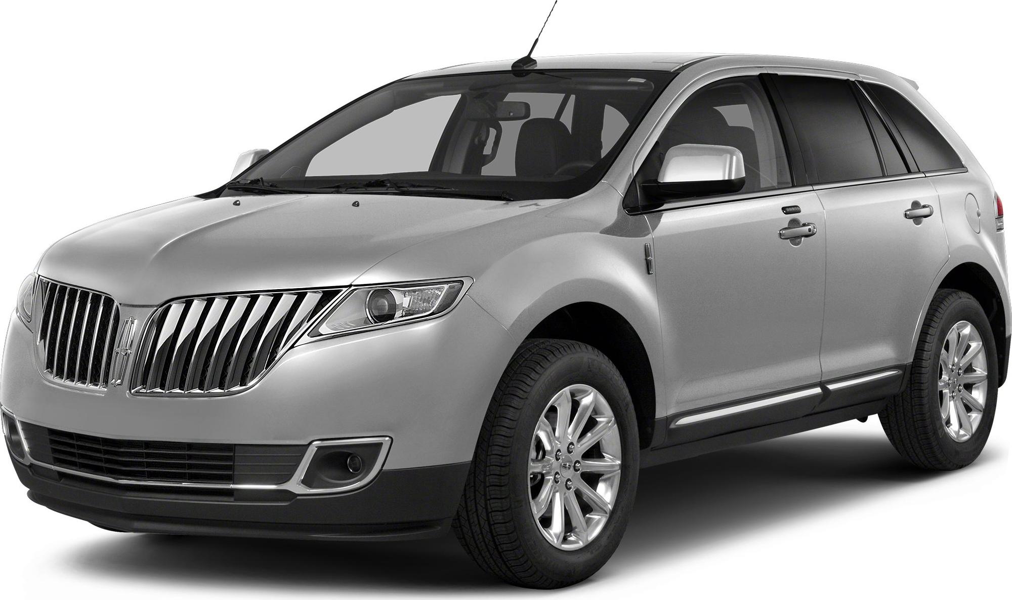 Silver SUV with prominent chrome grille and alloy wheels, front-side profile