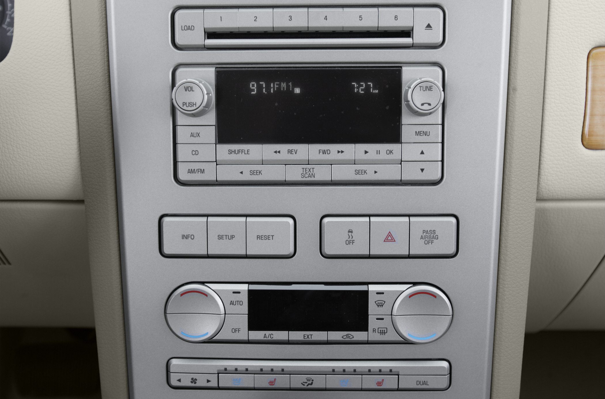 Close-up of car audio system and climate control panel