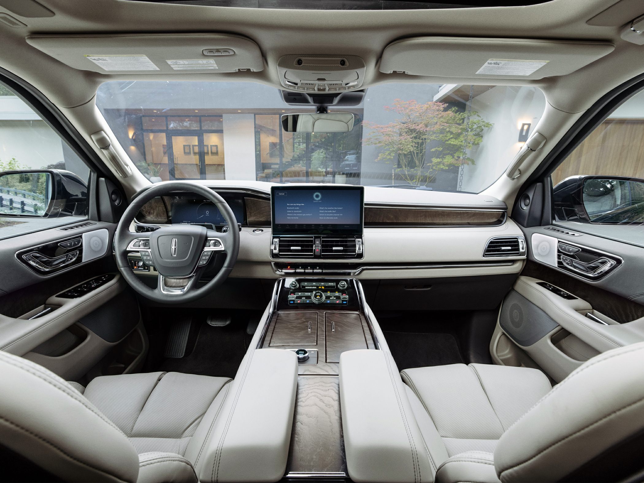 Luxury SUV interior with advanced dashboard and touchscreen infotainment