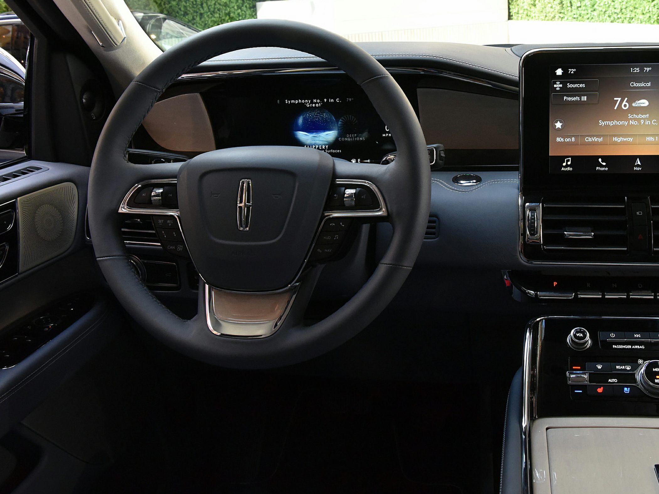 Luxury steering wheel and digital dashboard with touchscreen infotainment