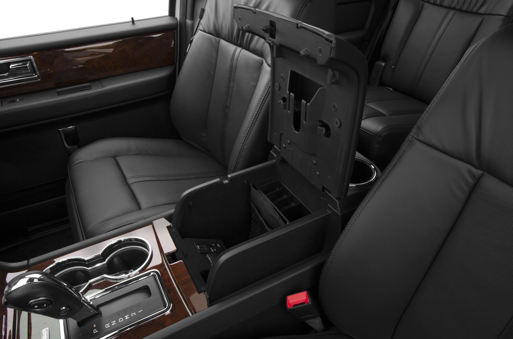 Luxury leather seats and open center console storage with wood trim