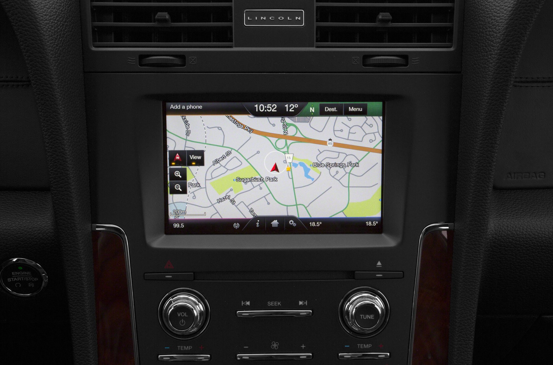 Touchscreen infotainment and navigation system with control knobs