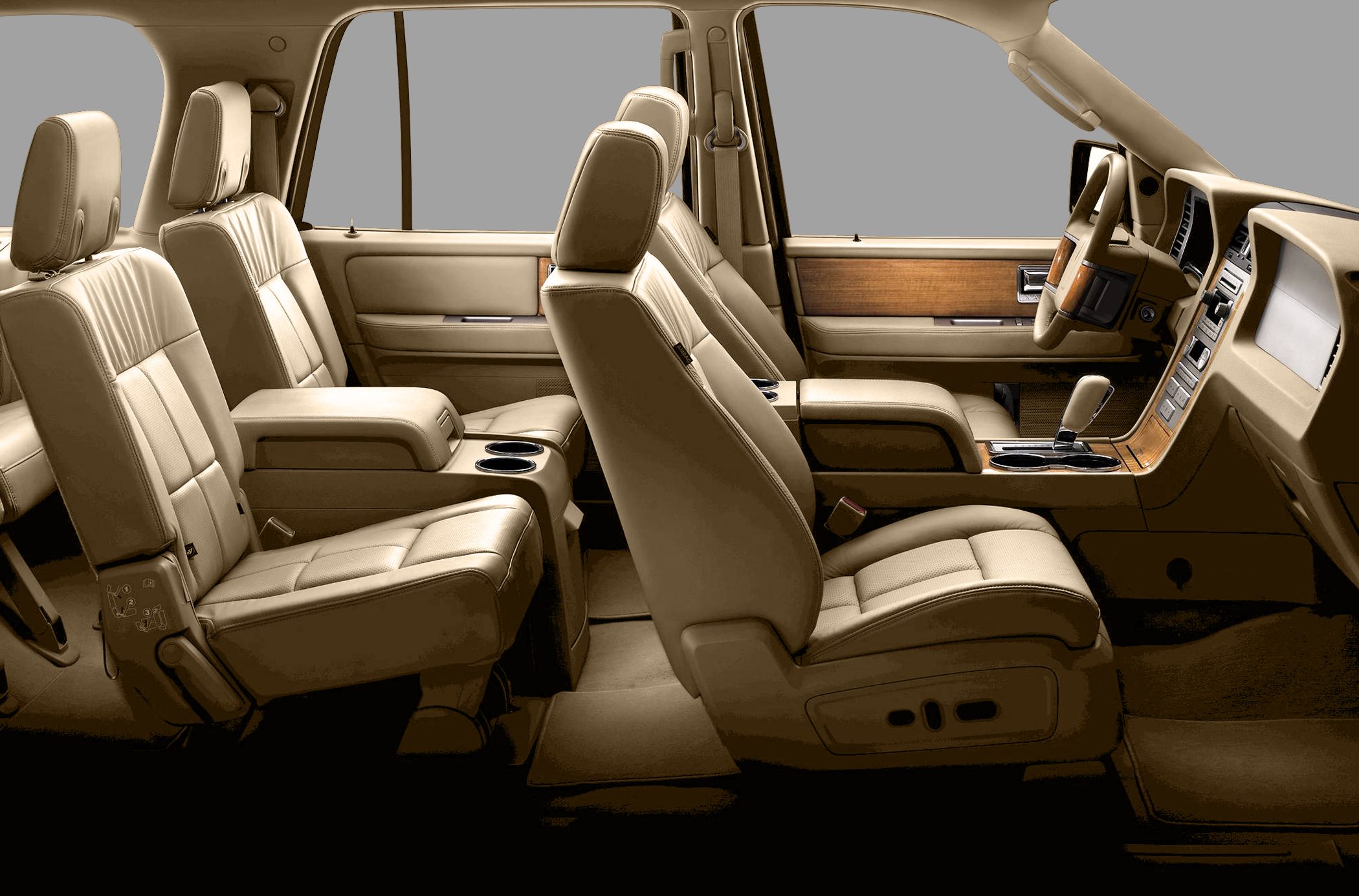 Tan leather seats and wood trim accents interior
