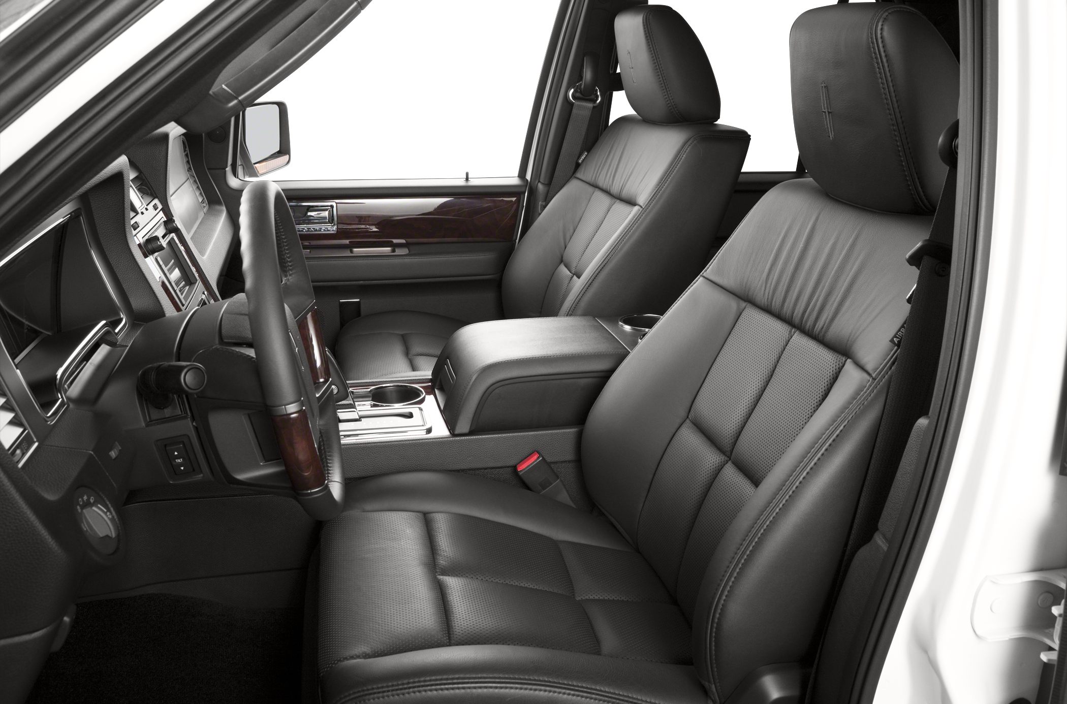 Black leather front seats and wood trim interior detailing