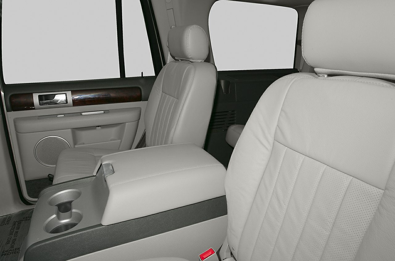 Luxury leather seats and center armrest in SUV interior