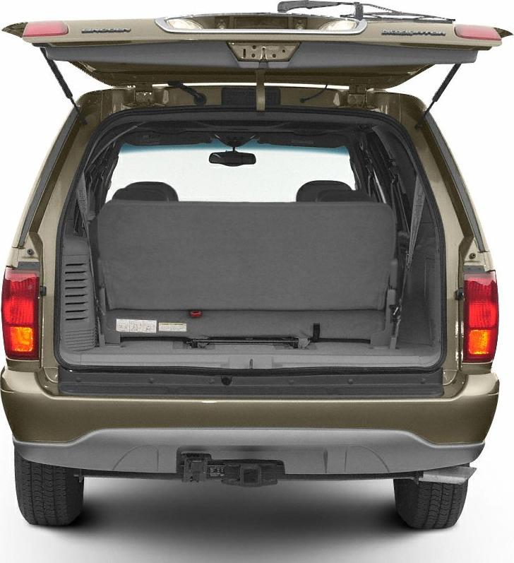 Rear open tailgate with visible cargo area and bench seat