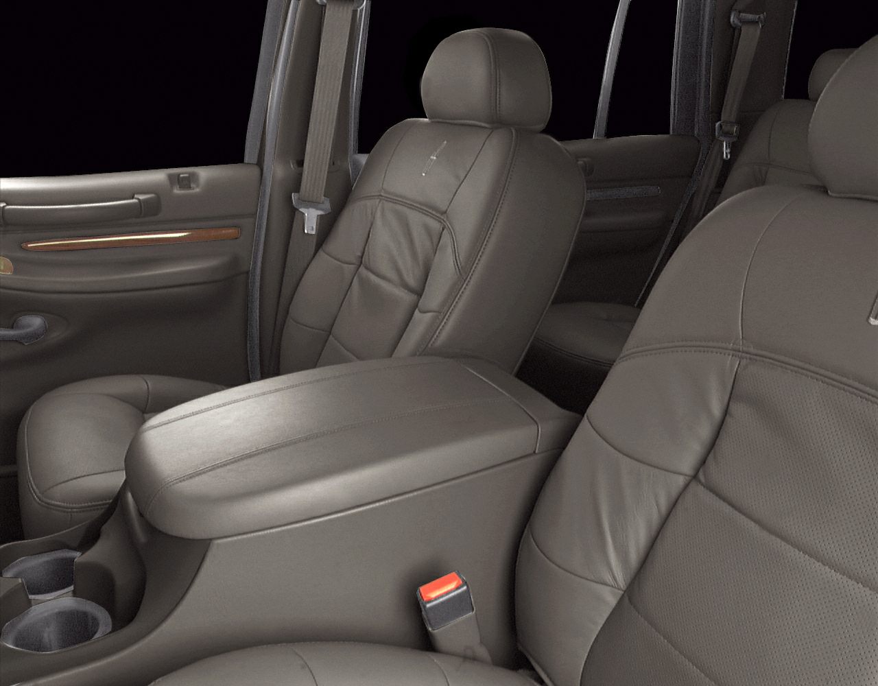 Leather front seats with central armrest and cup holders