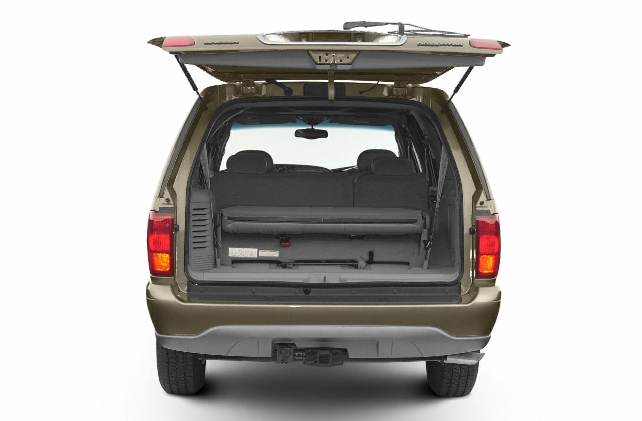 Open tailgate with spacious rear cargo area and rear seats