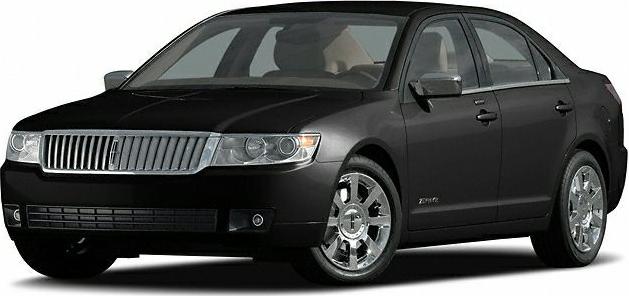 Front grille and chrome alloy wheels on black luxury sedan