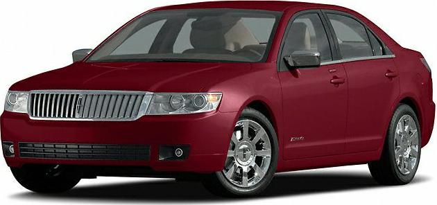 Front angle of luxury four-door sedan with chrome wheels and distinct grille.