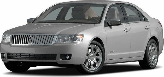 Silver sedan with chrome wheels and a vertical grille