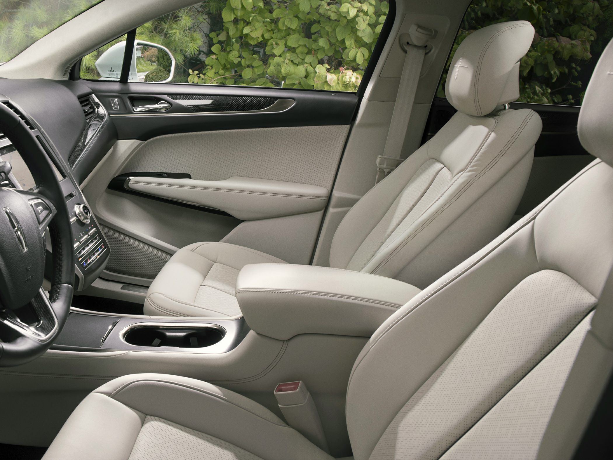 Beige leather seats with refined luxury interior trim.