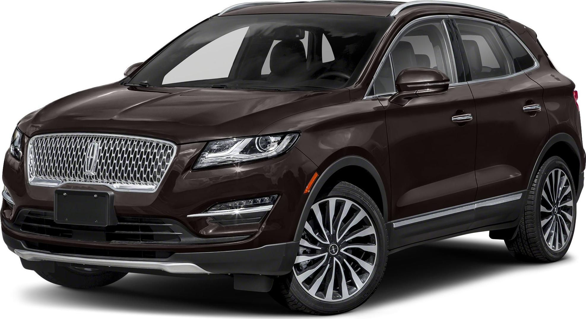 Distinctive front grille and multi-spoke alloy wheels on a dark brown SUV