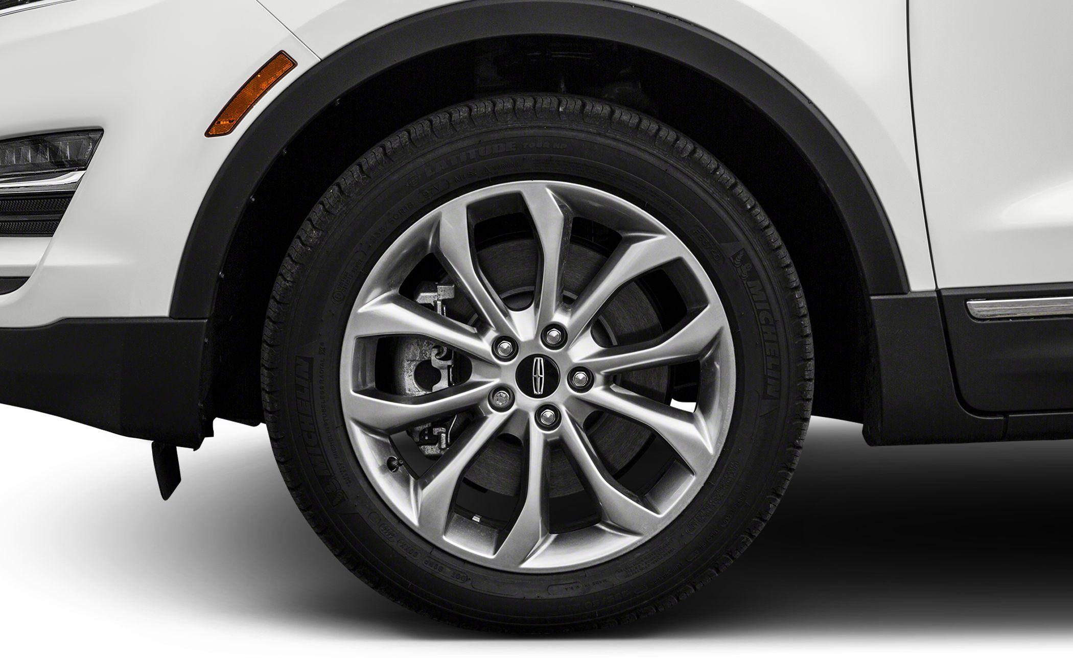 Close-up of alloy wheel and tire with Lincoln emblem and Michelin tire branding