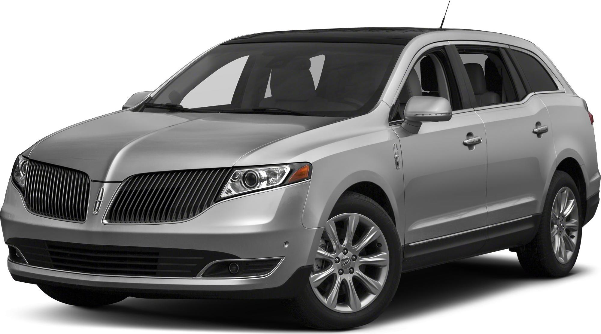 Front-side profile with distinctive grille and sleek headlights