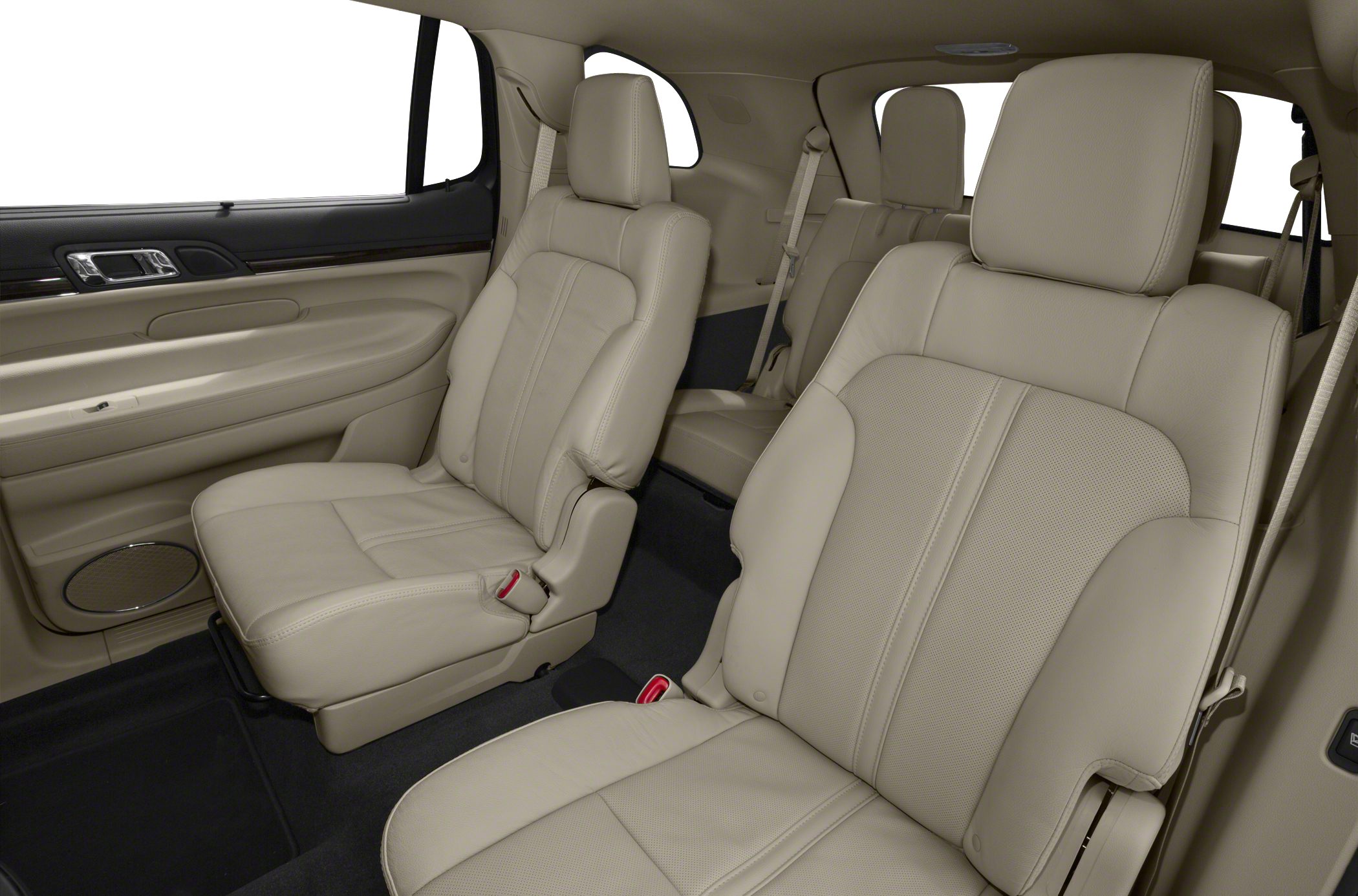 Beige leather captain seats and spacious third-row seating in car interior