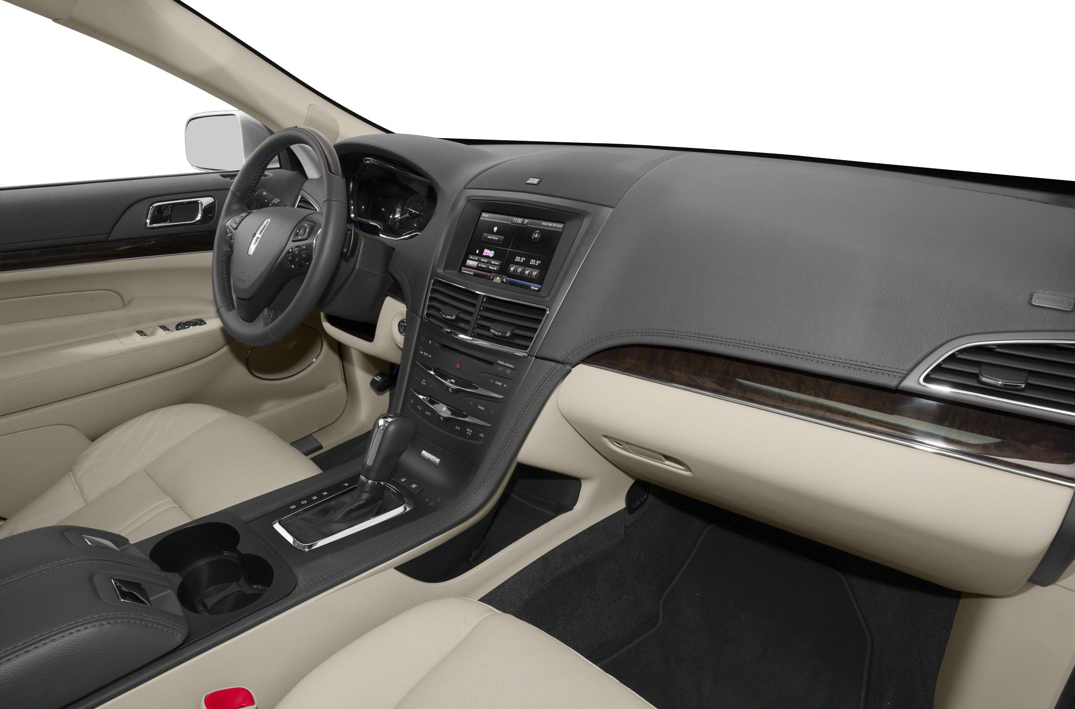 Luxury dashboard and center console with infotainment screen and beige leather interior