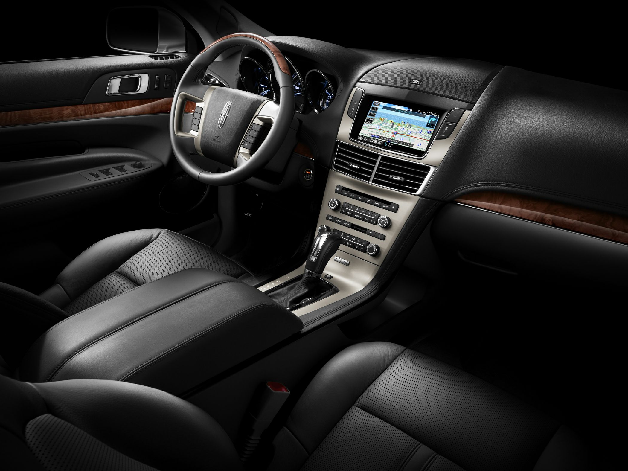 Leather seats, wood trim, navigation screen, steering wheel controls