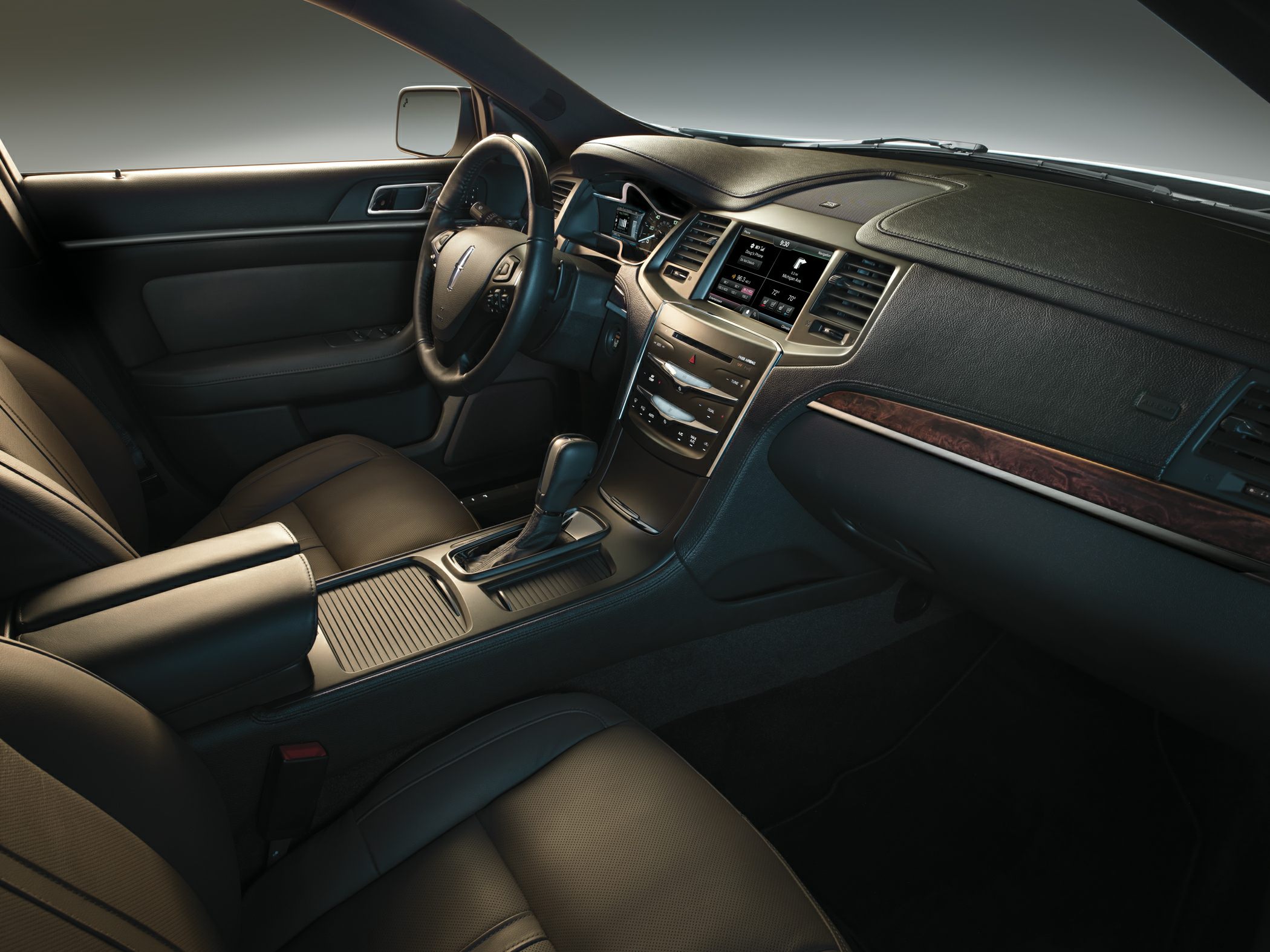 Leather seats, advanced dashboard, touchscreen controls, automatic gearshift