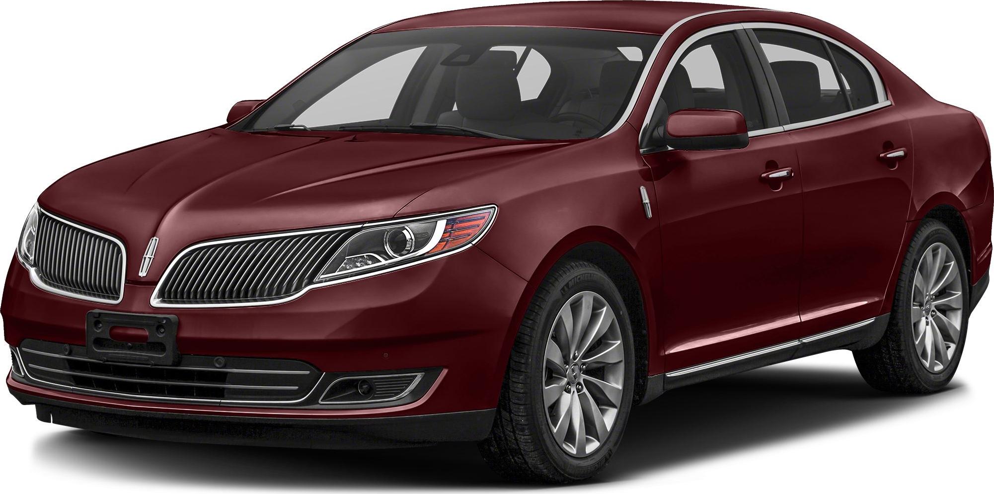 2013 sedan with split grille, chrome trim, and alloy wheels