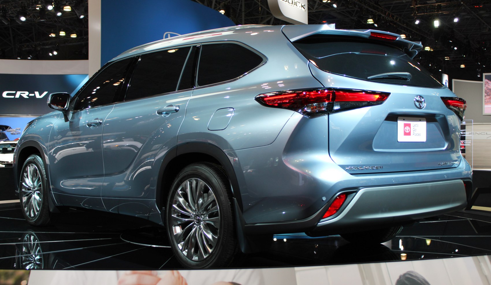 Rear view with sleek tail lights and alloy wheels on SUV