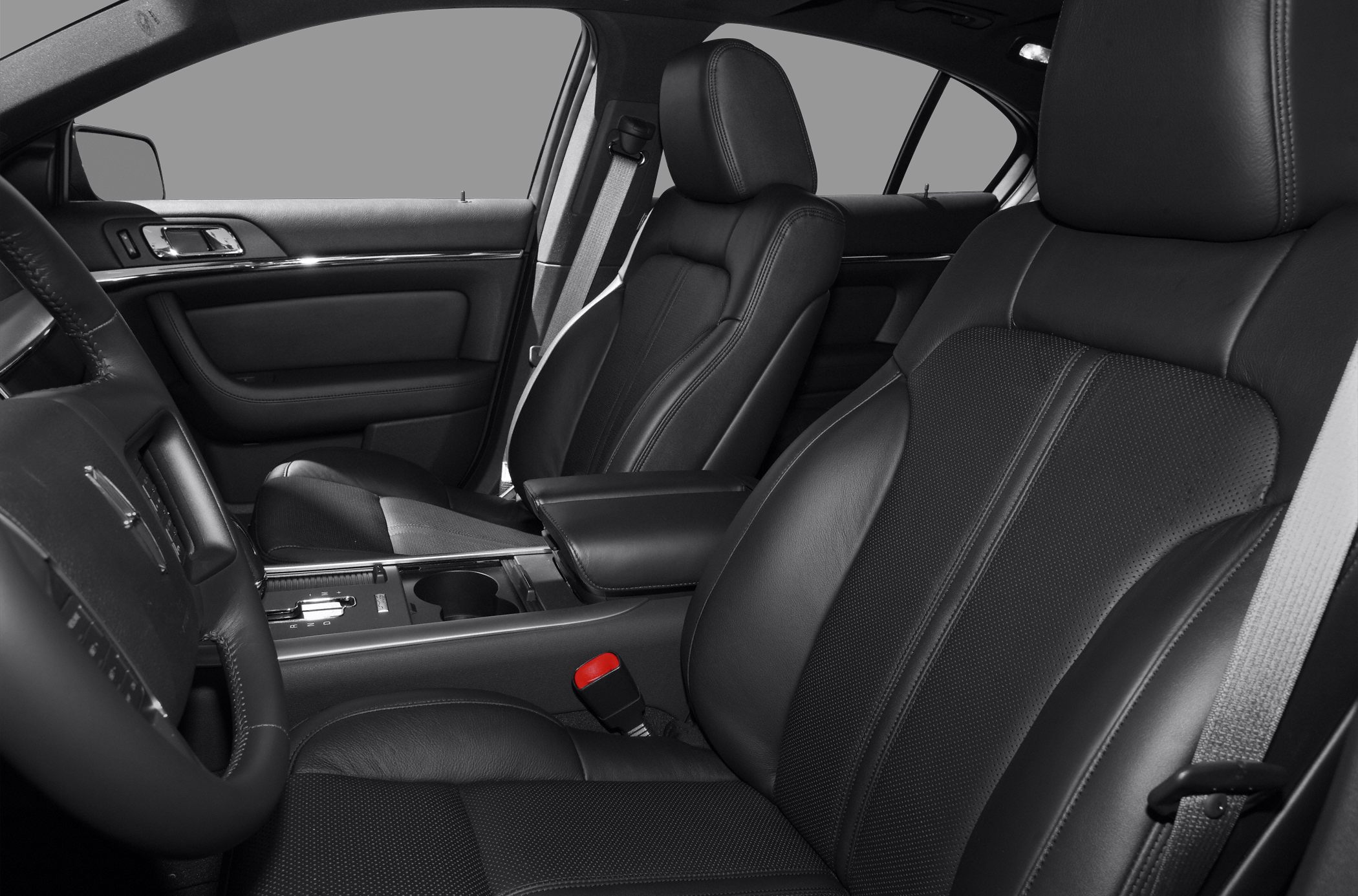 Luxury leather front seats with center console and armrest.
