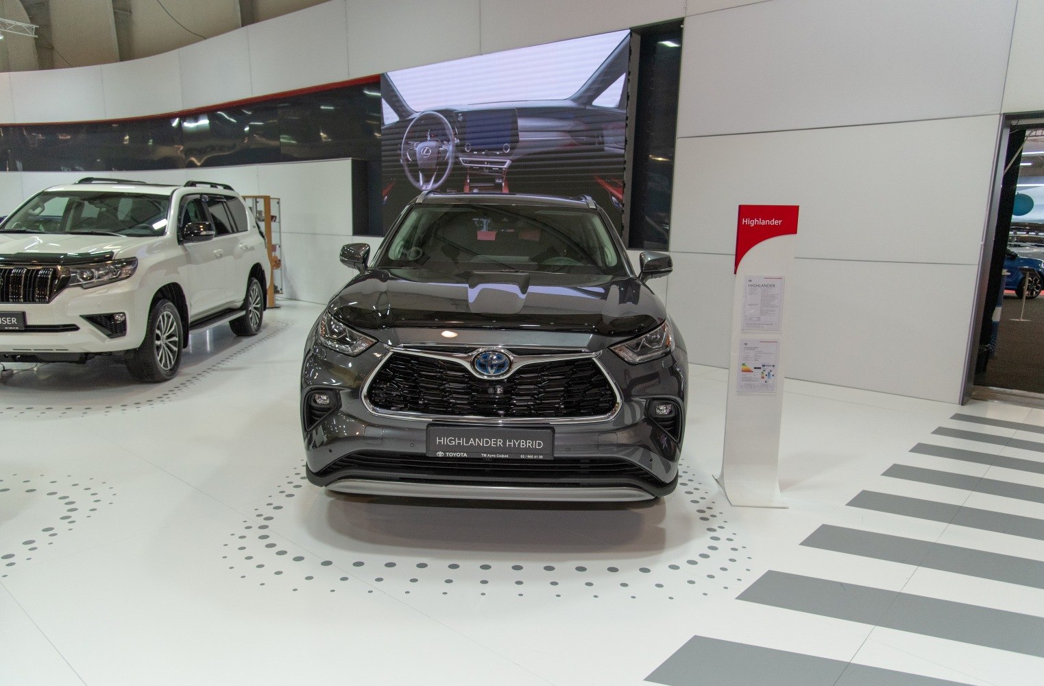 Front view of hybrid SUV with dashboard display