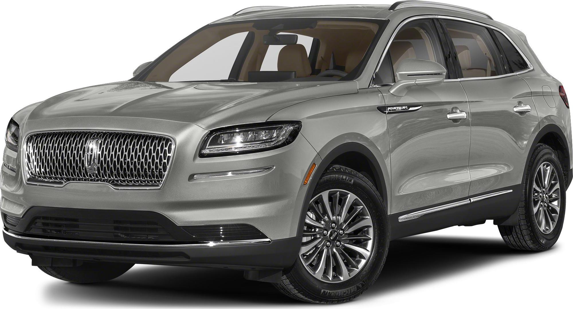 Front side view of SUV with chrome grille and LED headlights