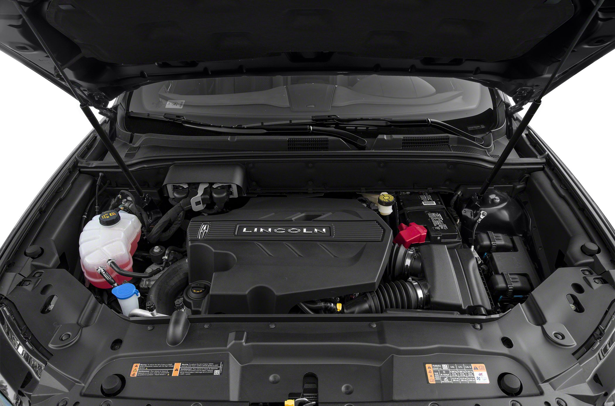 Engine bay with modern engine cover and organized components