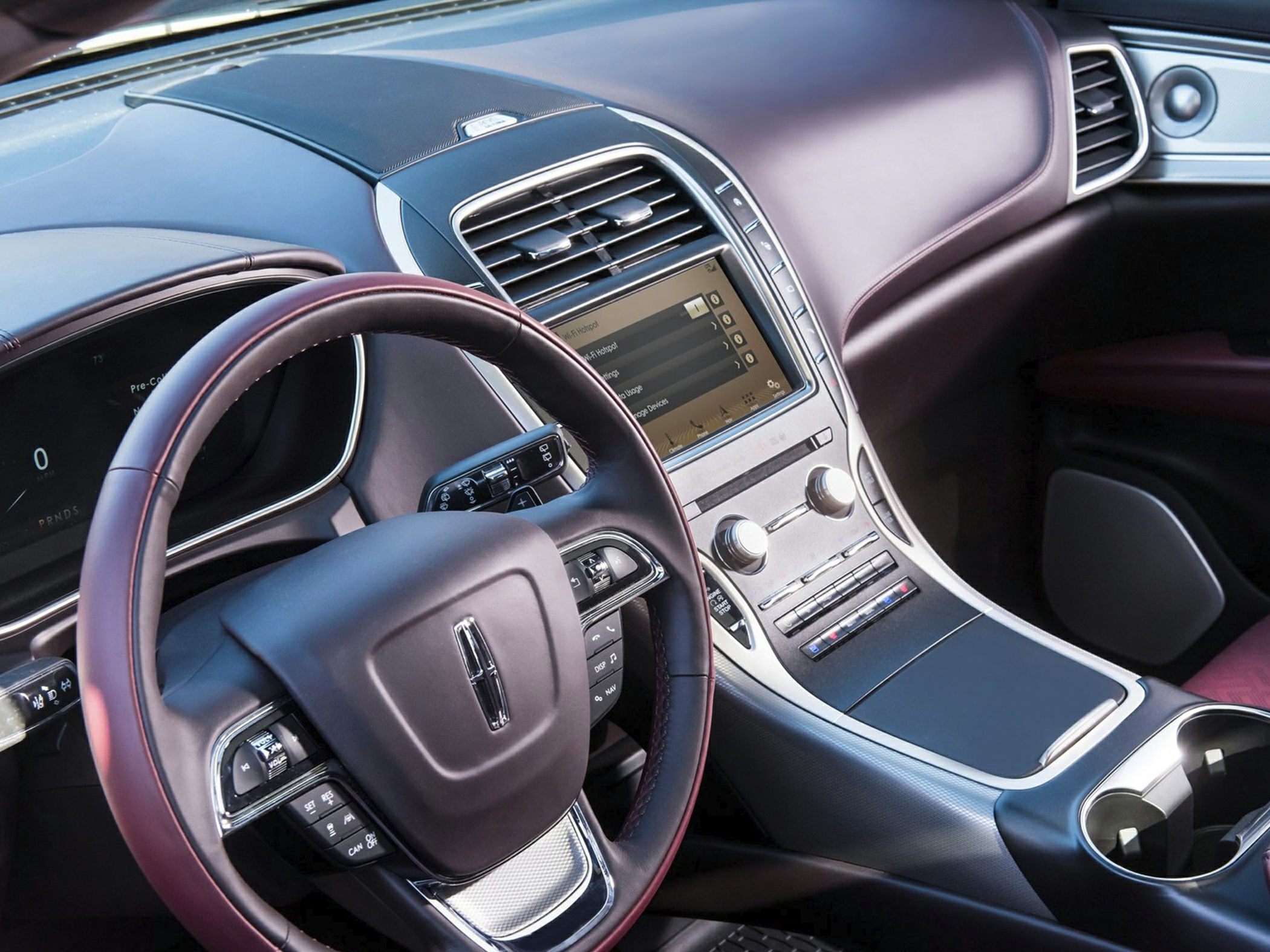 Modern dashboard with touchscreen and multifunction steering wheel