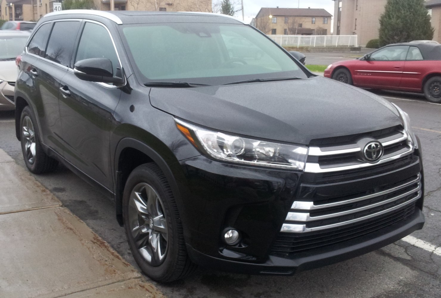 SUV front grille with chrome bars and LED headlights