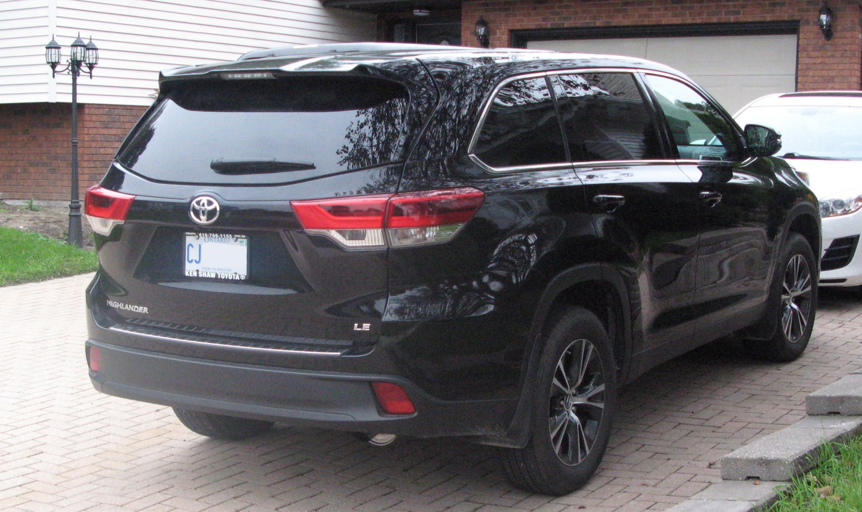 Rear view of modern SUV with distinctive taillights and tinted windows