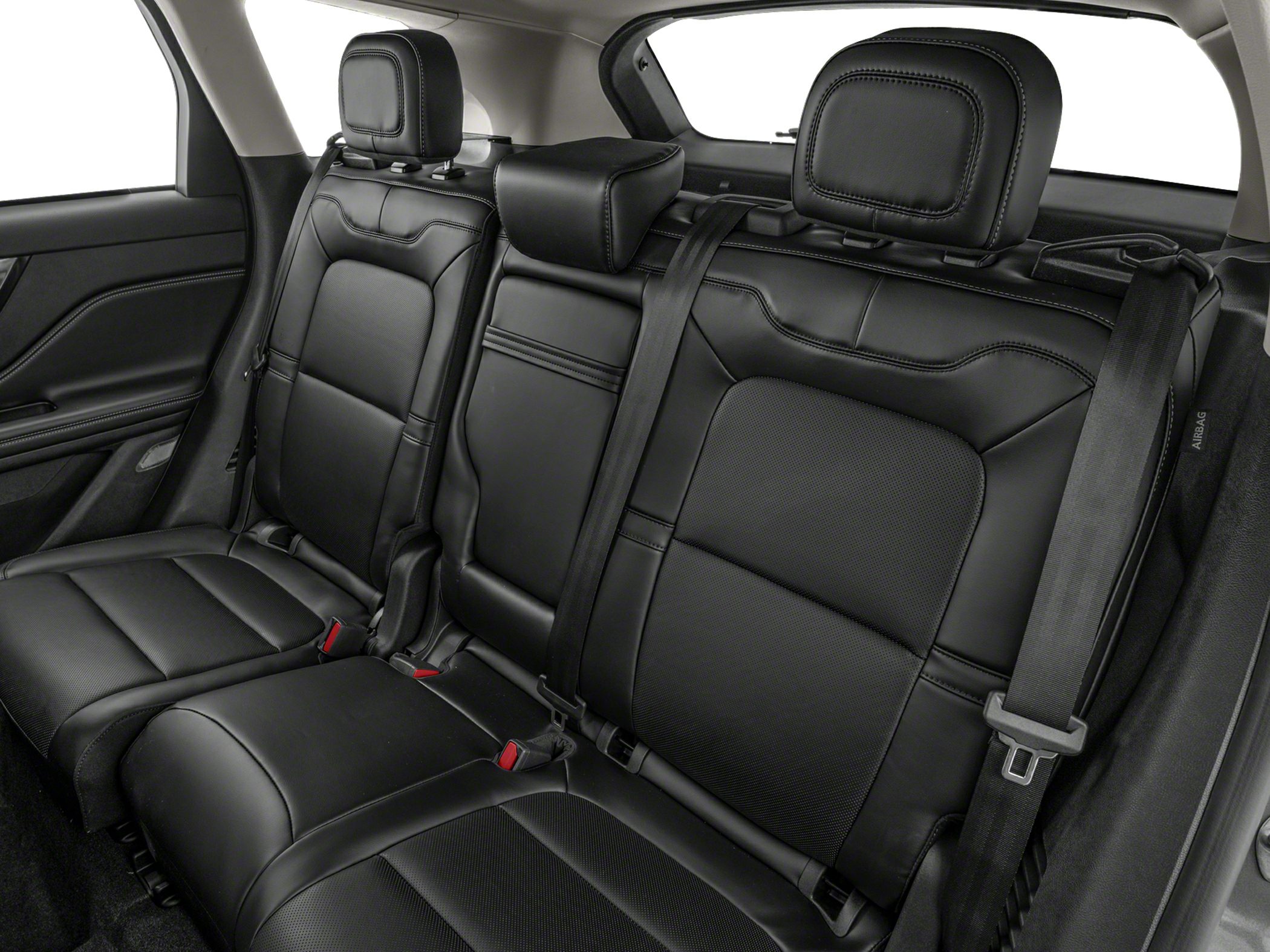 Black leather rear seats with headrests and seatbelts
