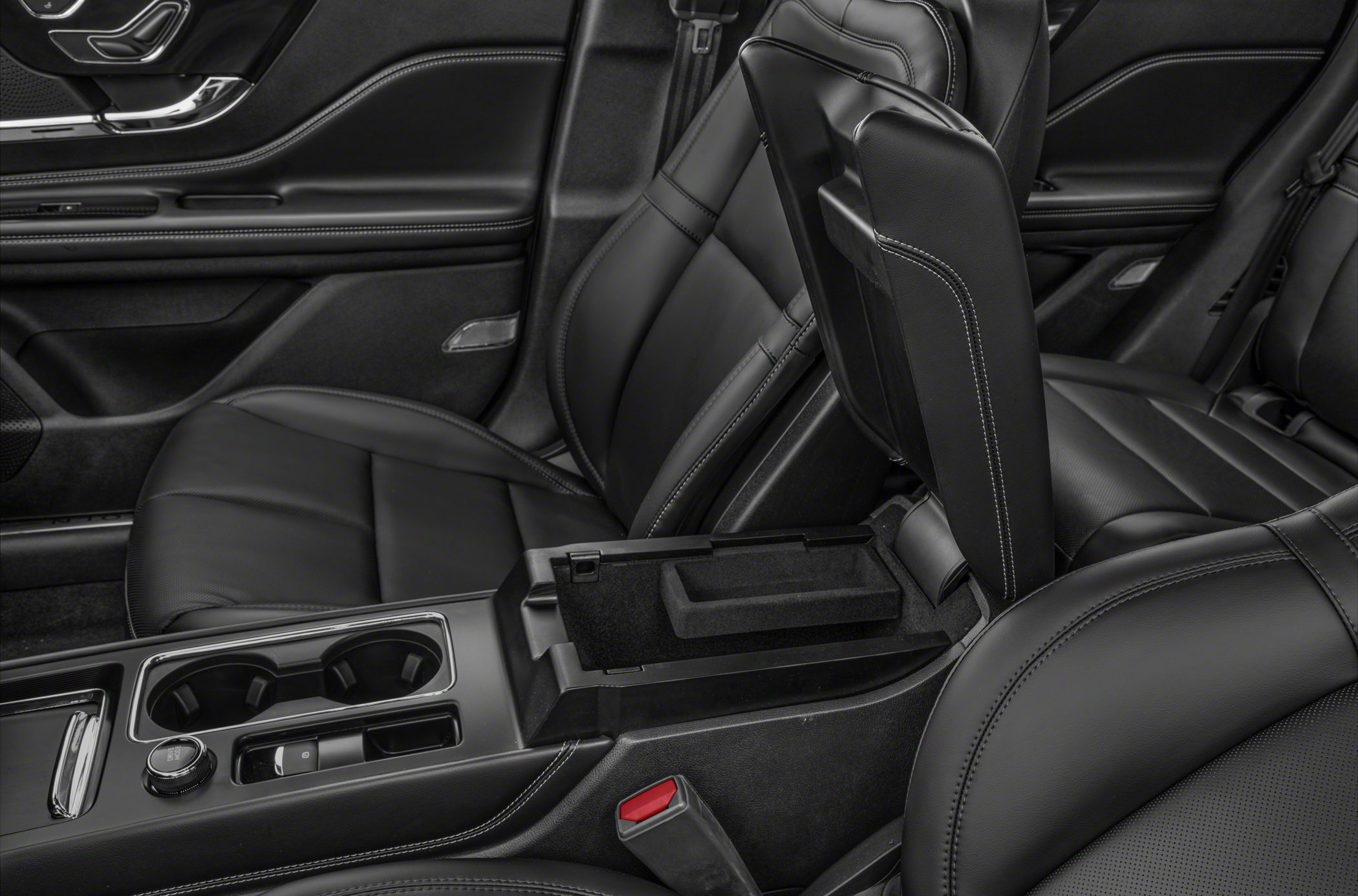 Center console with storage and leather seat details