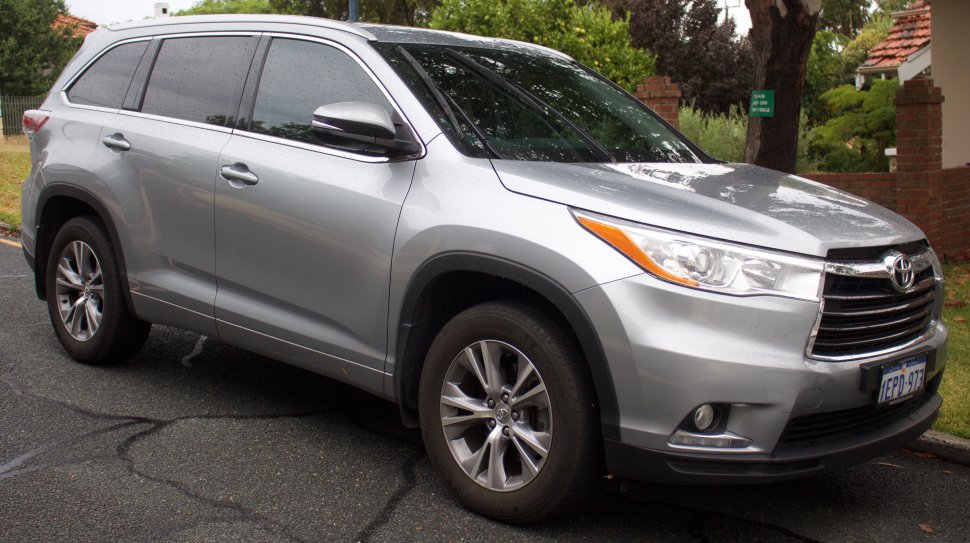 Silver SUV front-side view with alloy wheels and tinted windows