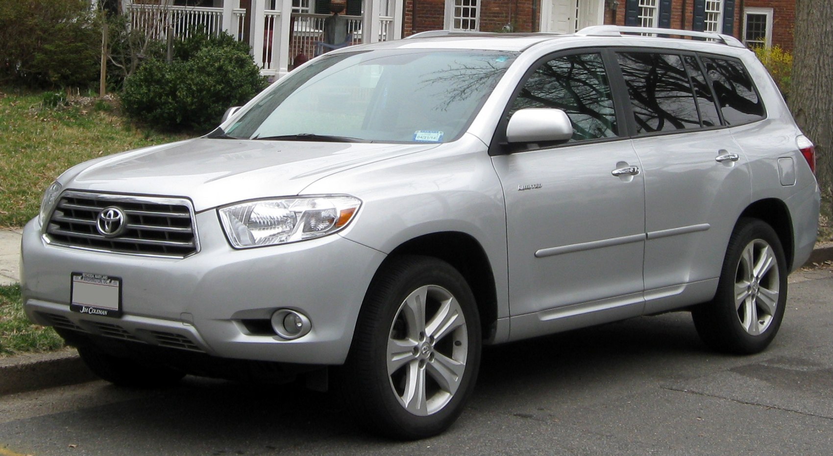 Silver mid-size SUV front and side view with alloy wheels and roof rails