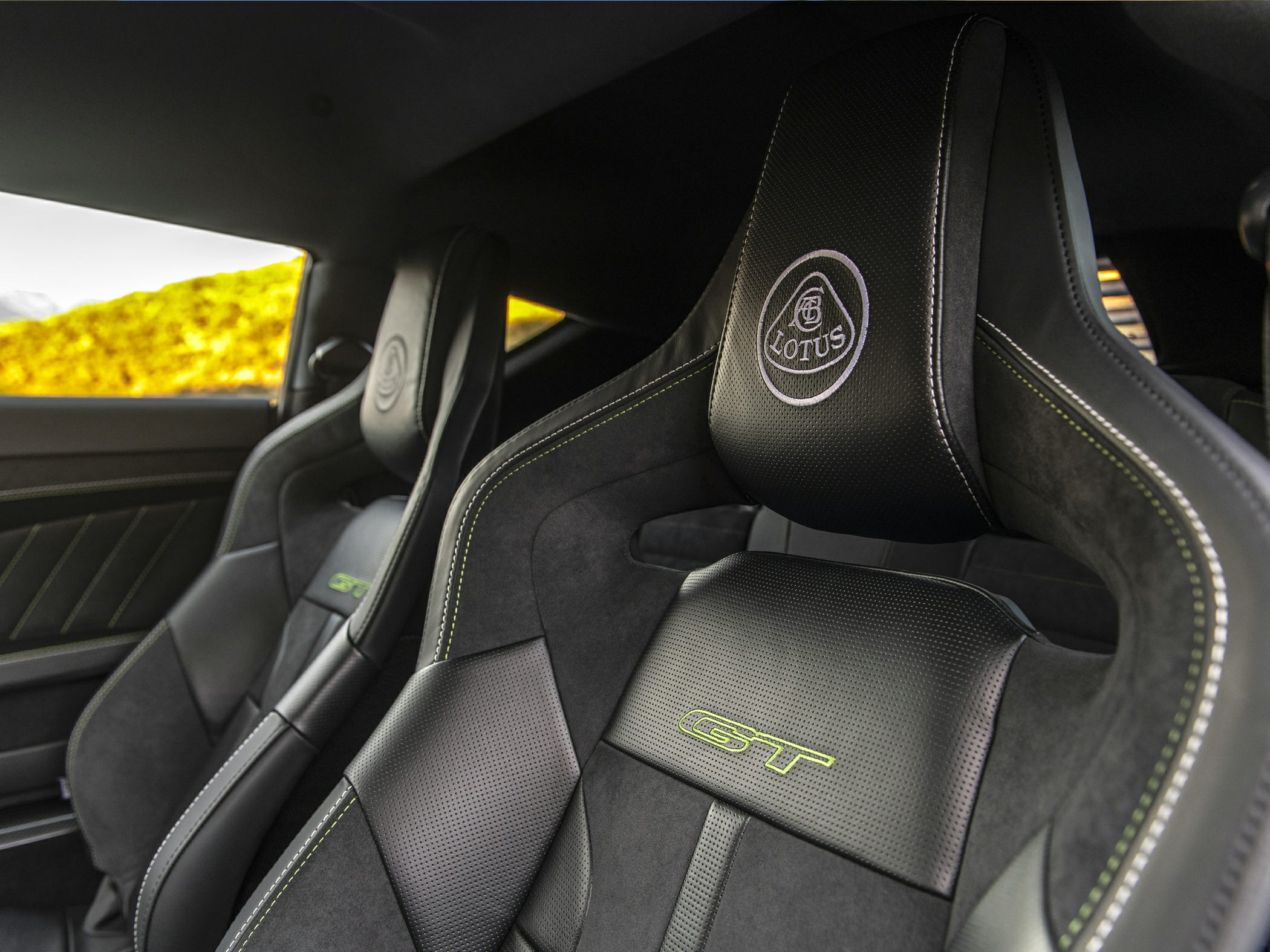 Sporty car seats with GT embroidery and detailed stitching