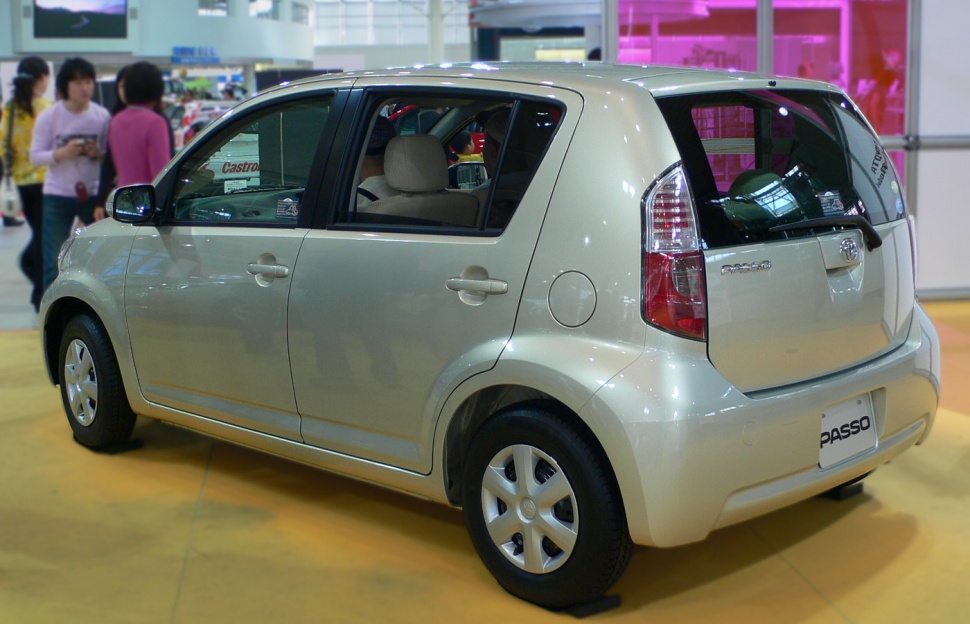 Compact hatchback rear side view with distinct rear light cluster