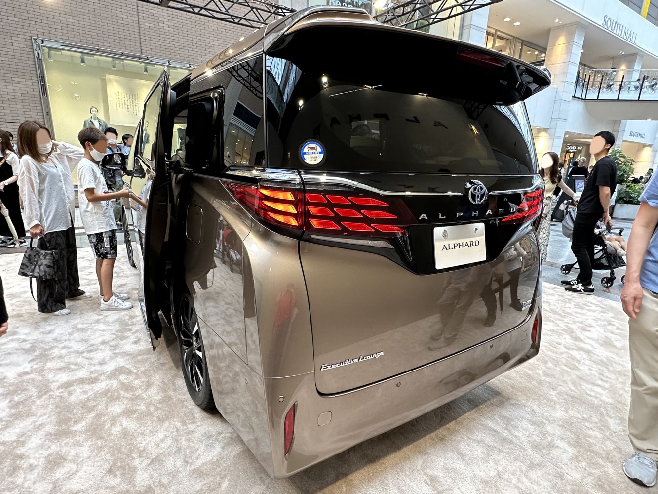 Rear view with LED tail lights and sliding door open