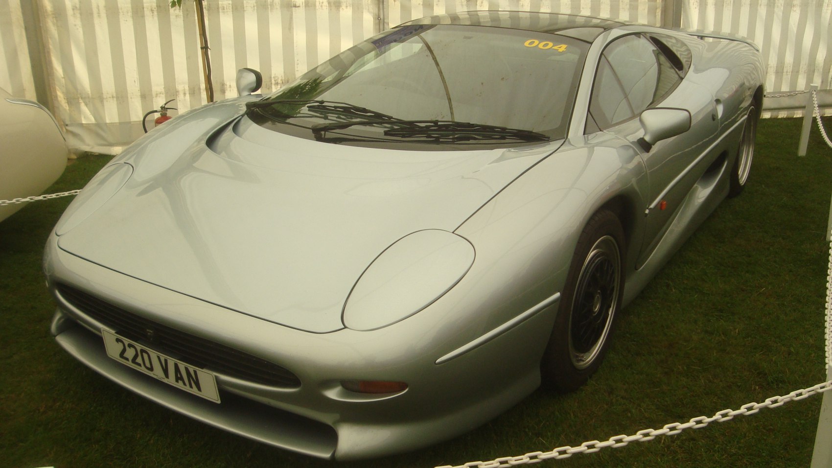 Sleek front view with aerodynamic shape and pop-up headlights