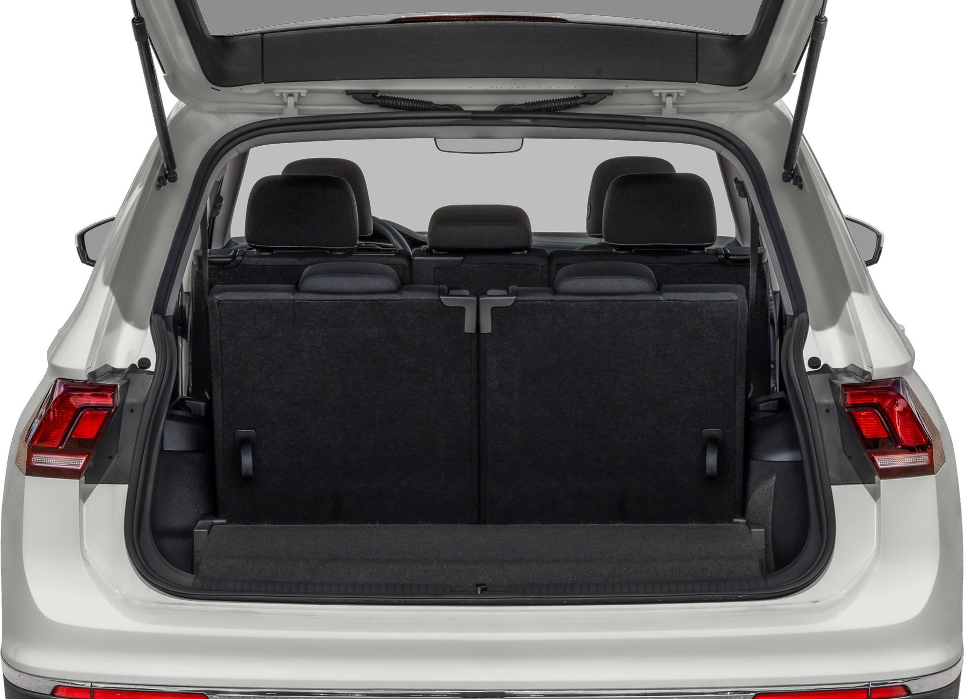 Opened rear tailgate with visible trunk and third-row seats