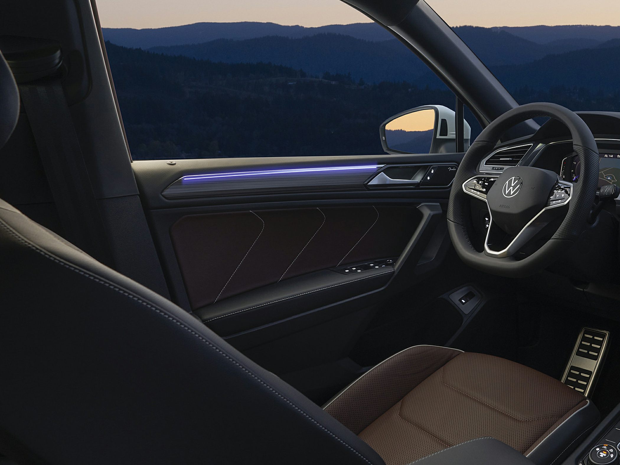Interior with LED ambient lighting and modern steering wheel