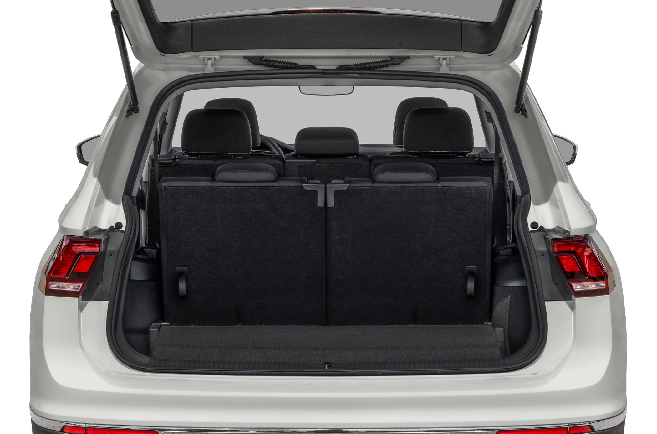 Open trunk with rear seats upright and visible headrests