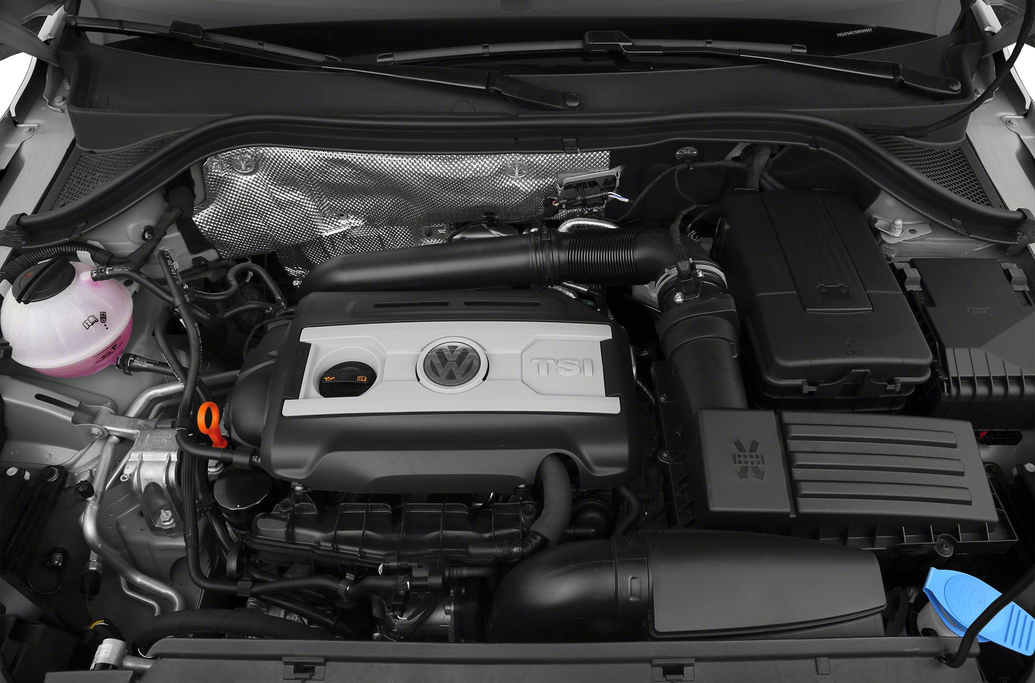 TSI engine bay with organized component layout and Volkswagen emblem