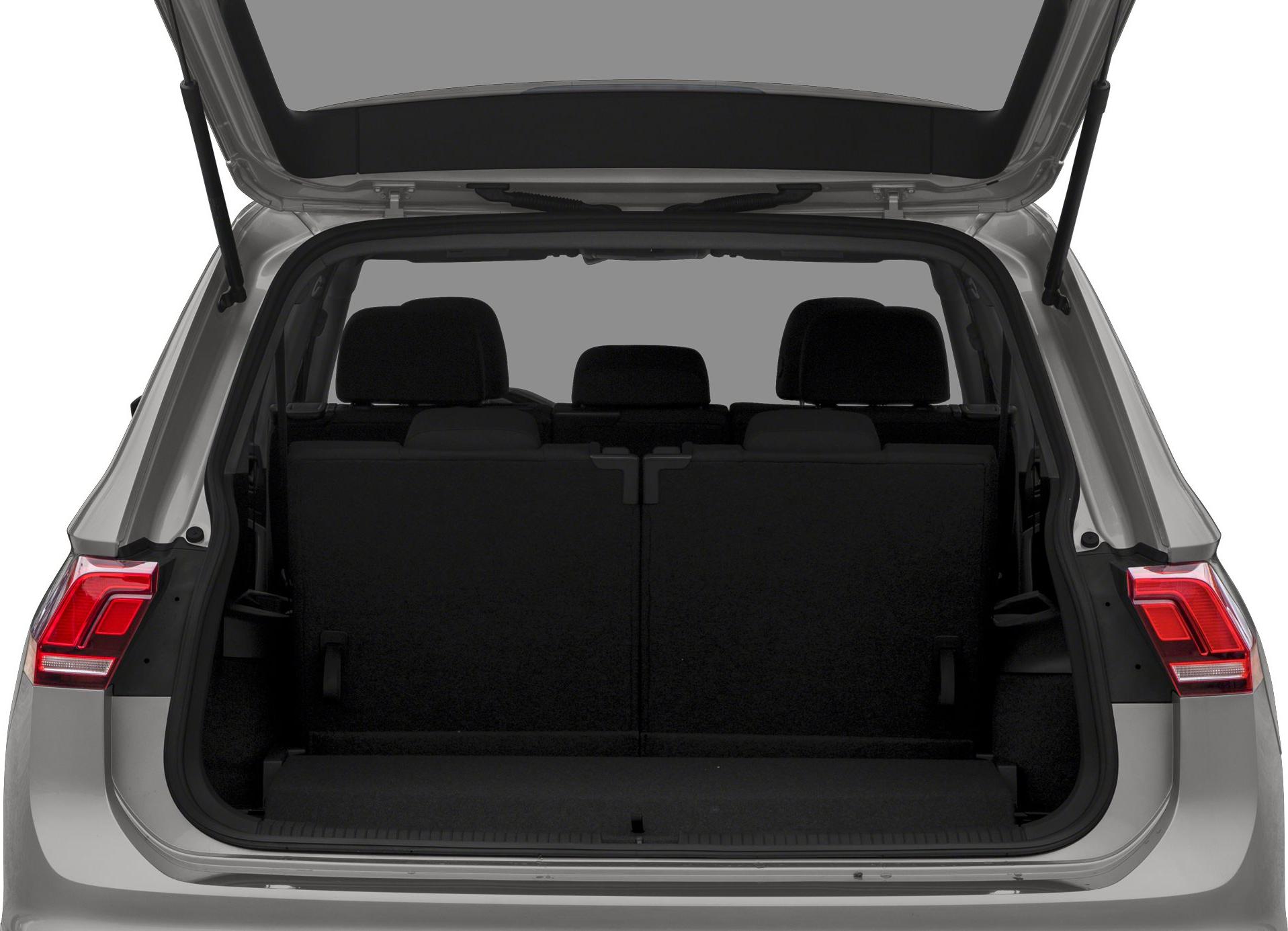 Open rear hatch and trunk area with folded rear seats